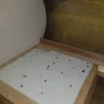 New replacement floor section prepared during damp repair