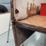 Close-up of damp rot inside motorhome wall structure