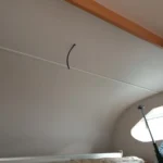 Finished interior wall after professional damp repair